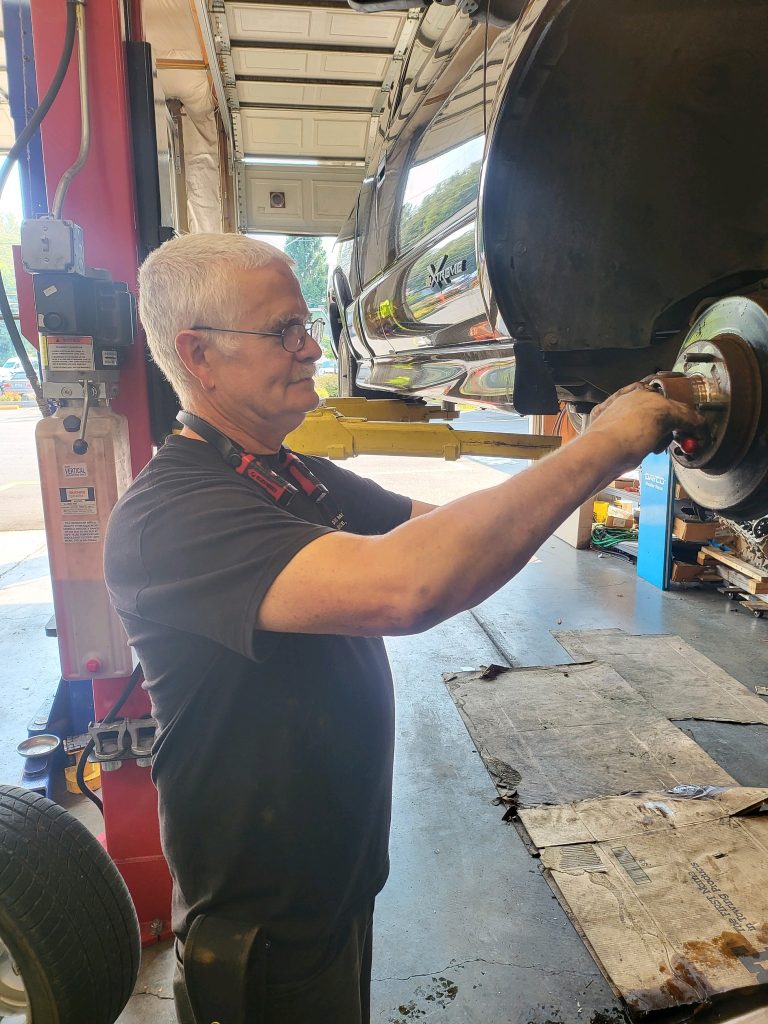 Our mechanic Jack hard at work on a customer vehicle