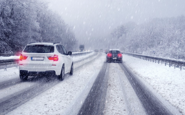 Cars driving through snow